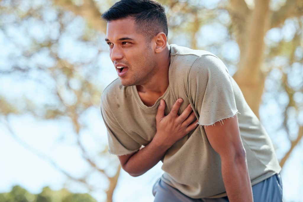 Man having heart attack pain.