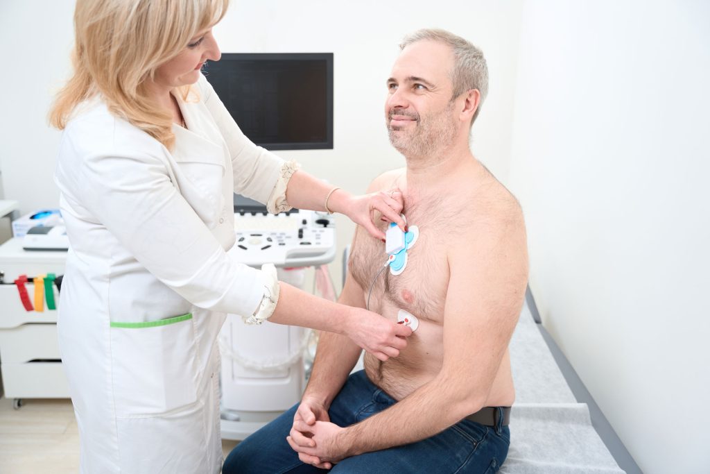 Man getting regular health checkup from a doctor.