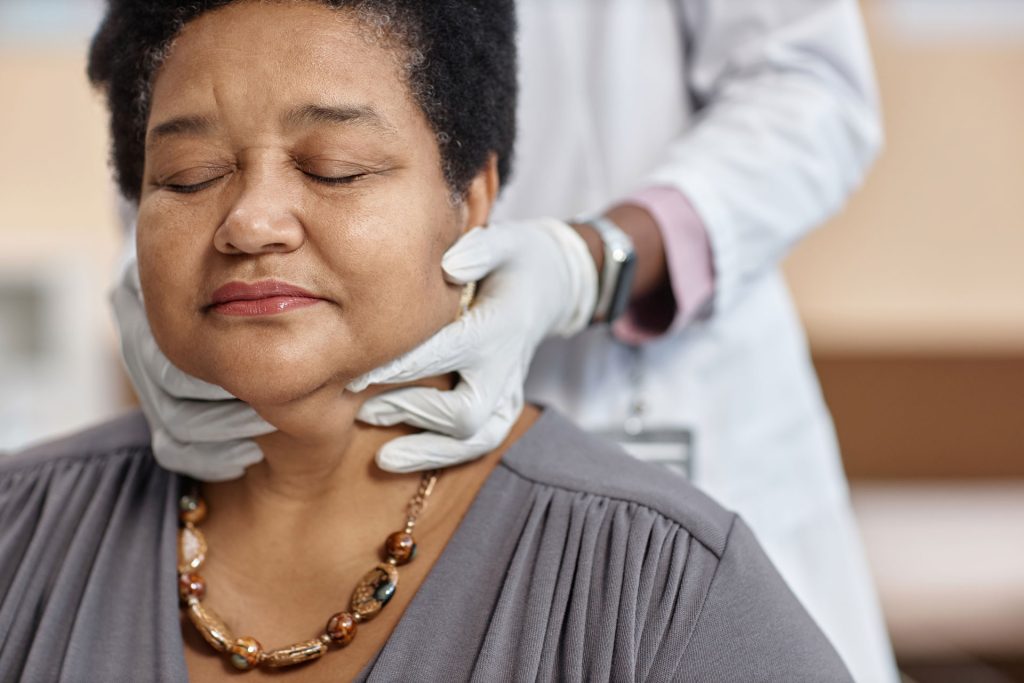 Female patient getting medical examination.