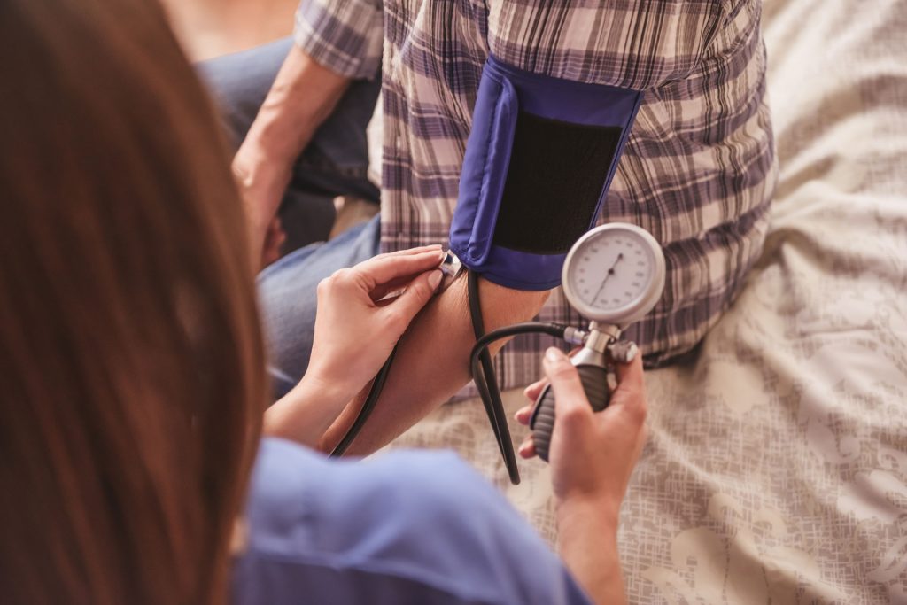 Patient with hypertension getting their blood pressure.