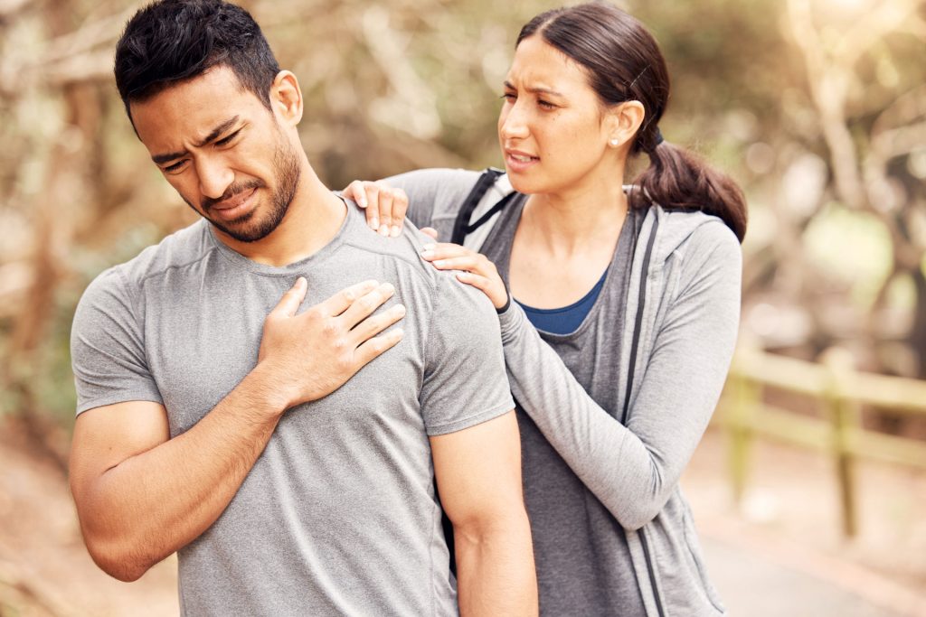 Man having chest pain, heart attack symptom.