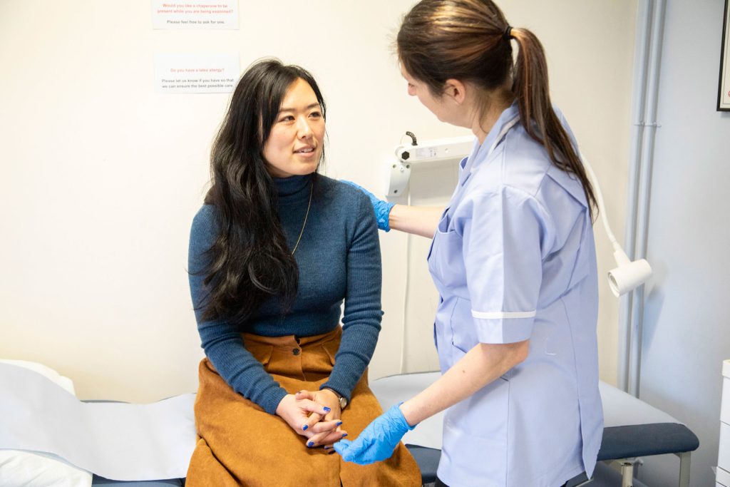 Nurse checkup to a patient.