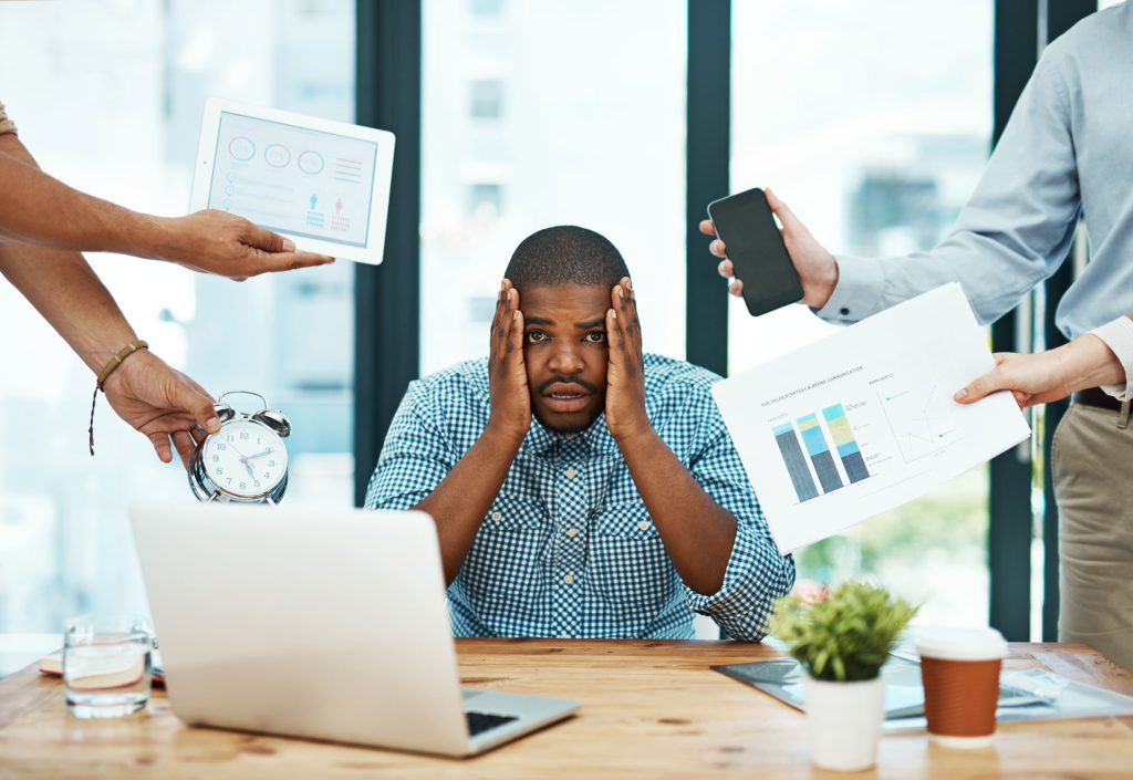 Stressed man in office.