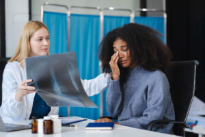 Doctor and patient talking about chronic disease management.