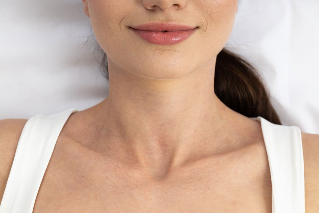 Close up of neck of woman.