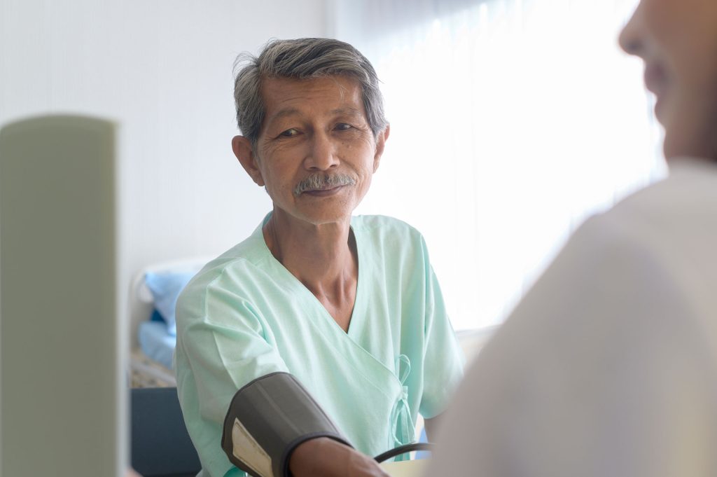 Senior man consulting to a doctor.