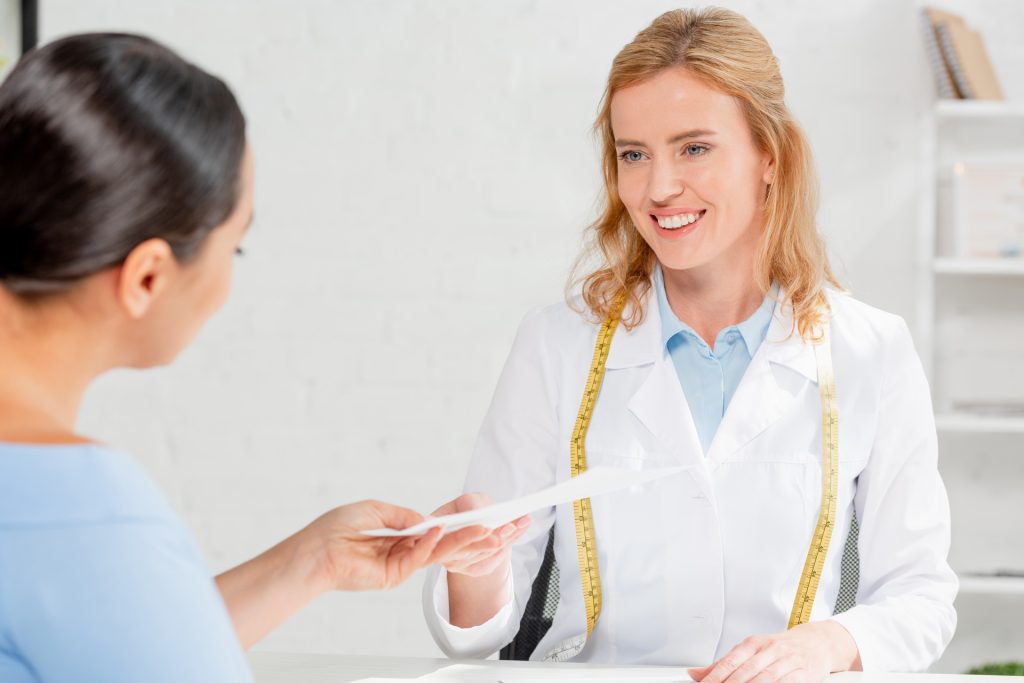 Smiling doctor.