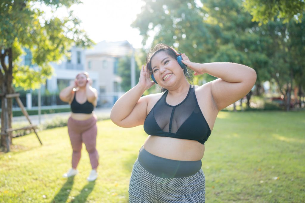 Woman in fitness wear exercising.